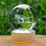 Lámpara cristal dinosaurio